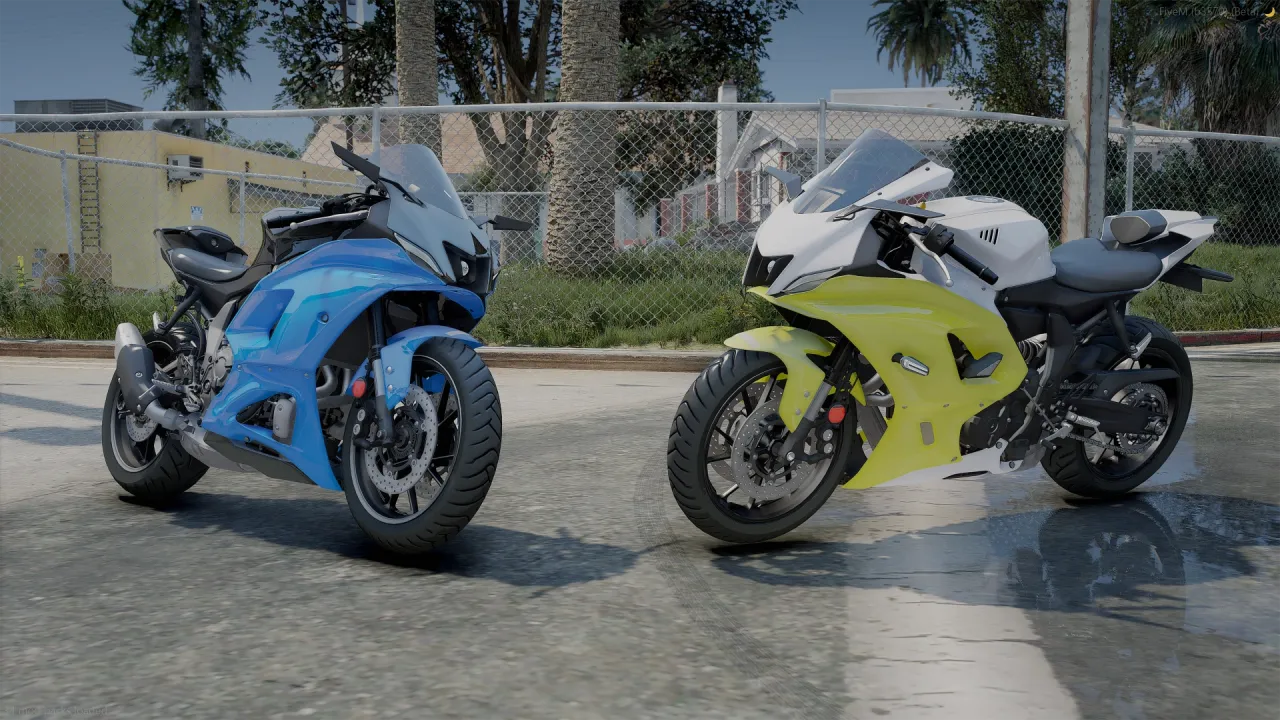 Yamaha YZF-R7 FiveM sportbikes in blue and yellow-white, front three-quarter beside a chain-link fence