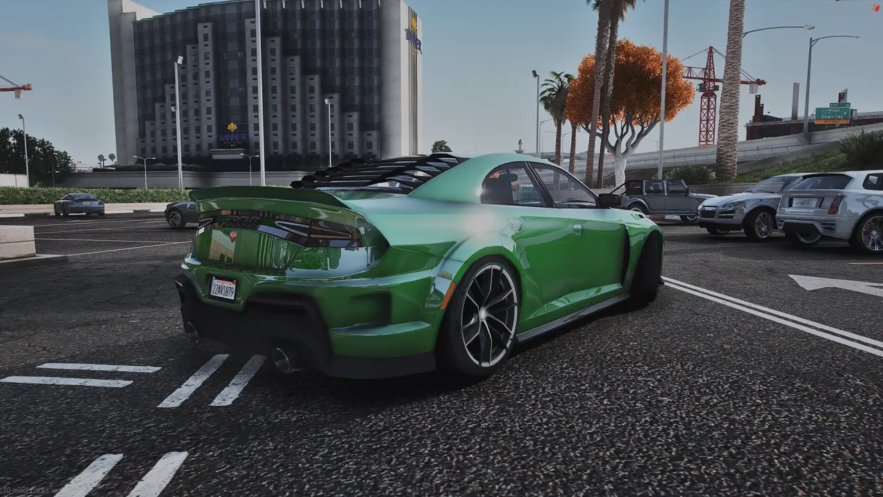 Bravado Buffalo TTS 15 rear three-quarter view in green with a ducktail spoiler and louvered rear window