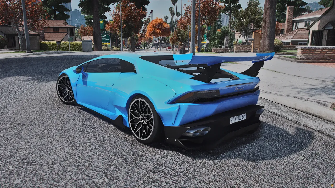 Pegassi Tempesta TTS in bright blue with a tall rear wing, rear three-quarter view on a residential street