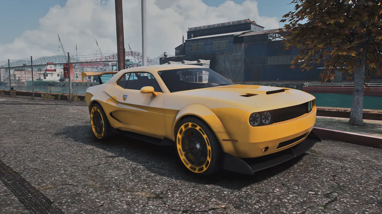 Bravado Gauntlet Hellfire TTS in yellow with yellow-rimmed black wheels, front three-quarter view by the docks