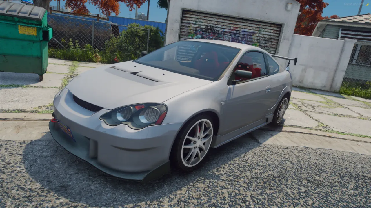 Integra DC5 Type R FiveM coupe in silver with white wheels and a red interior, front three-quarter by a garage