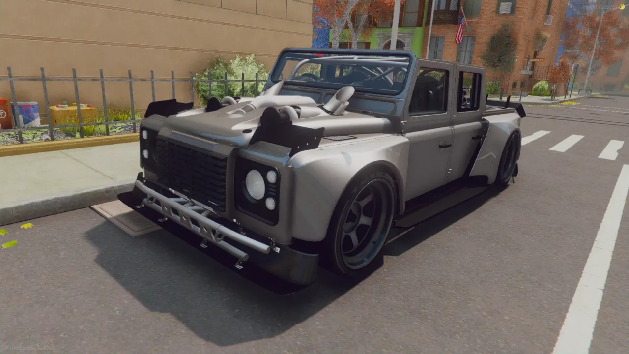 Land Rover Defender 110 2017 FiveM pickup in silver with a front bull bar and exposed intake piping on a city street