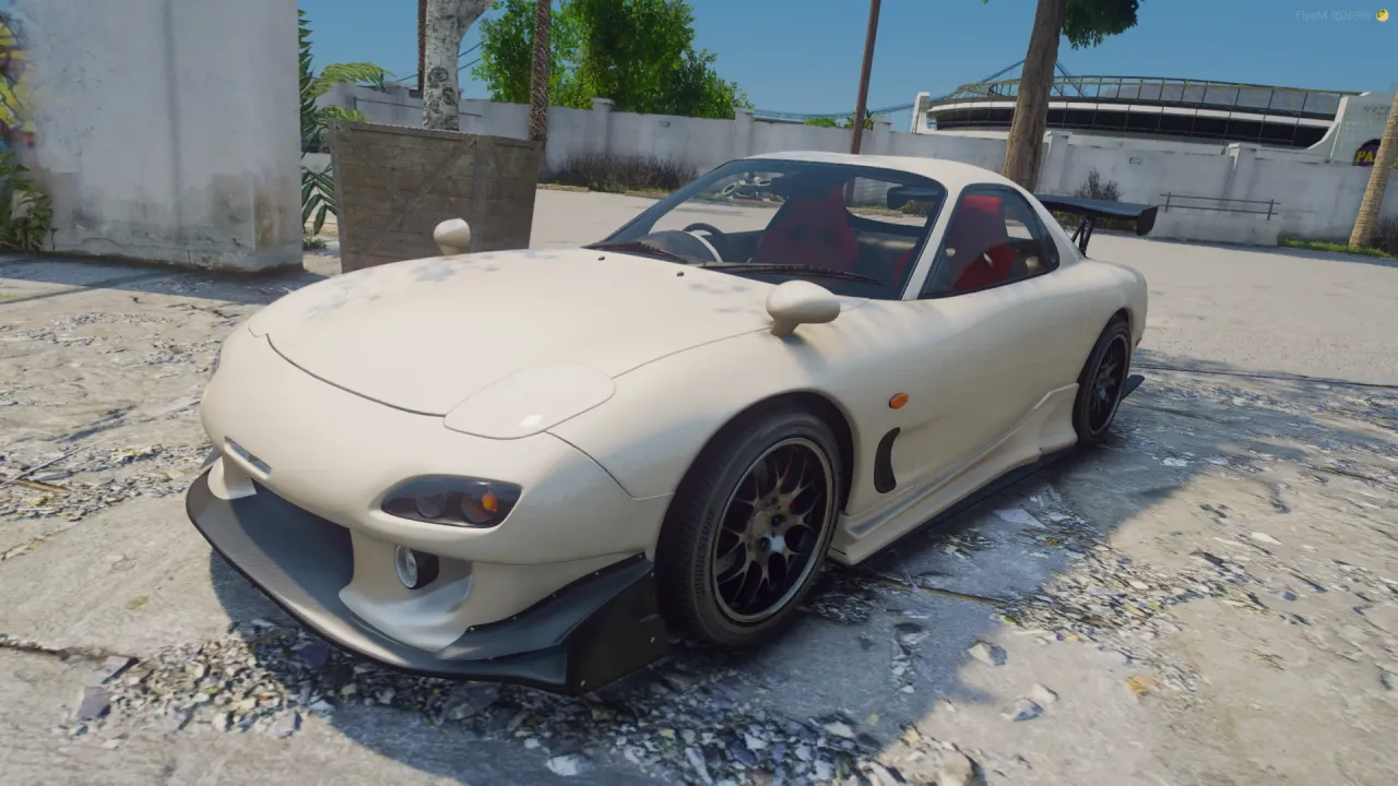 Mazda RX RX-7 FiveM car in cream white with bronze wheels and front lip, front three-quarter view on a gravel lot