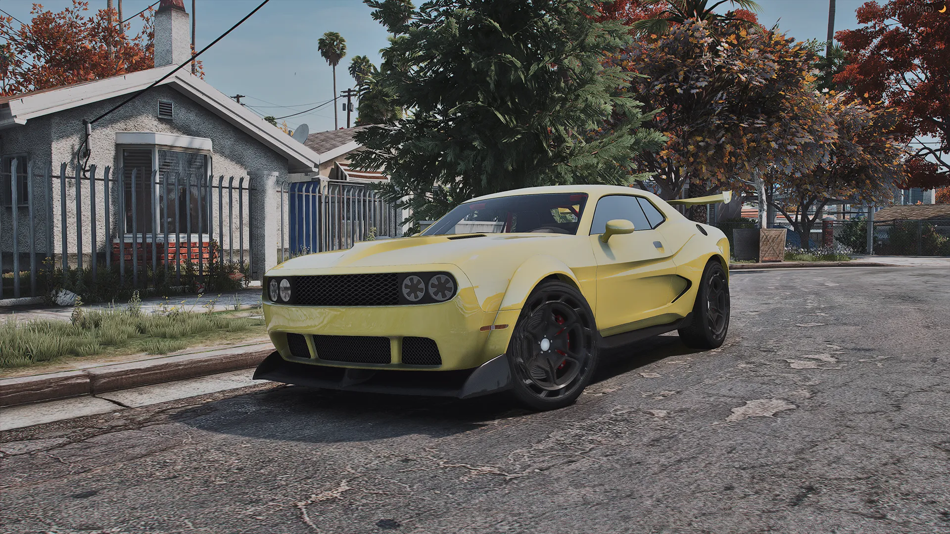 Bravado Gauntlet Hellfire TTS in pale yellow with black wheels parked on a suburban street, front view