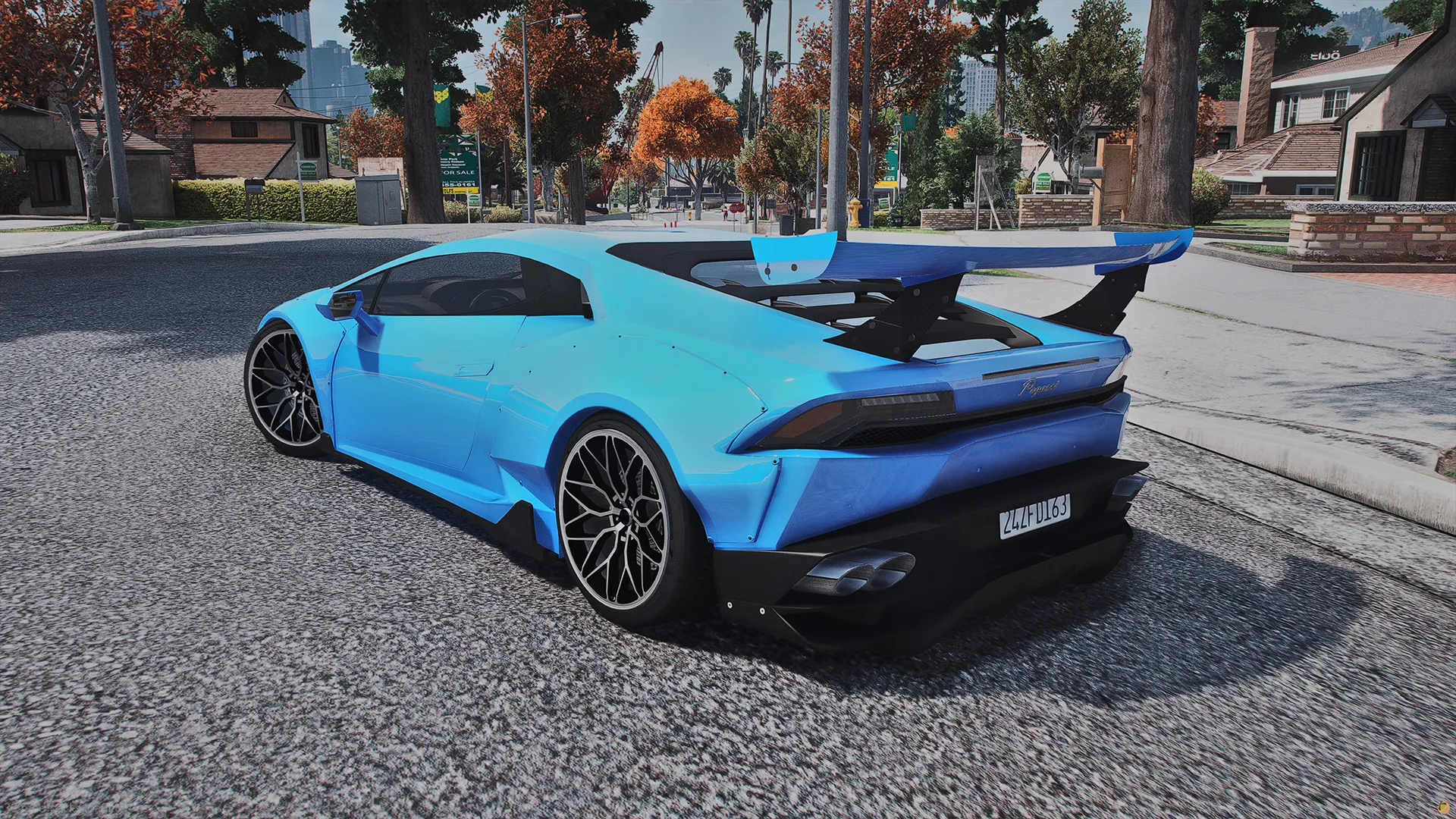 Bright blue Pegassi Tempesta TTS with a tall rear wing, rear three-quarter on a residential street in FiveM