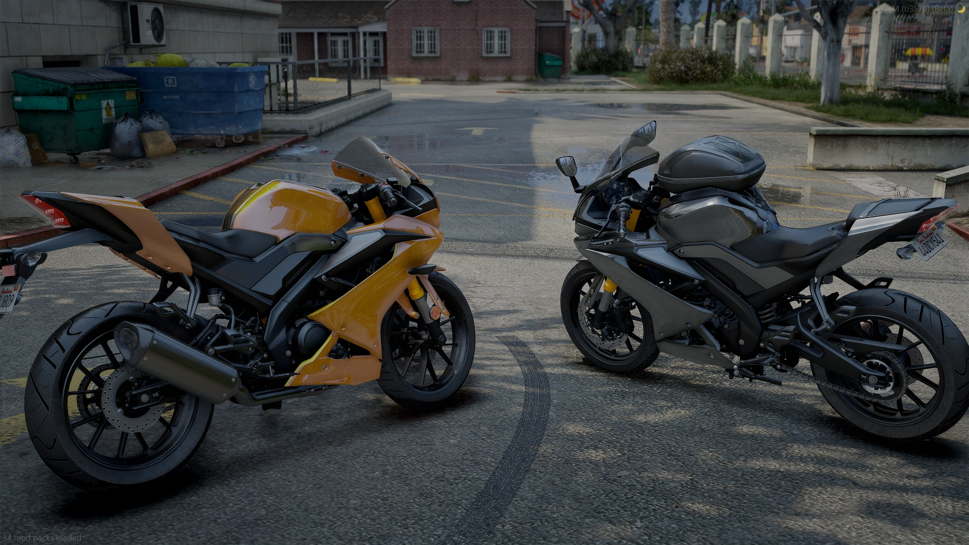 Yamaha YZF-R125 (2019 - 2022) orange and grey pair in rear three-quarter view on a wet lot by dumpsters