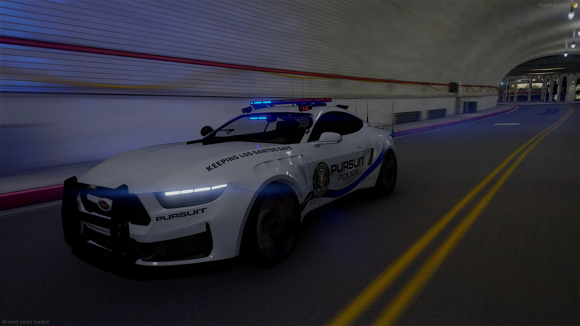 Vapid Dominator Black GT 24 in white Pursuit Police livery with push bar and blue lights in a lit tunnel