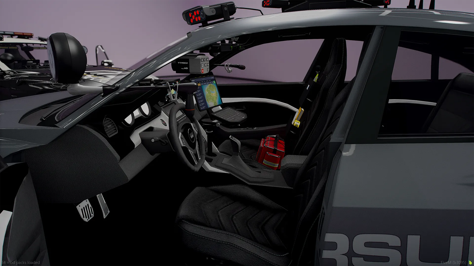 Obey Omnis e-GT cabin with open driver door showing laptop mount, dash radar and fire extinguisher
