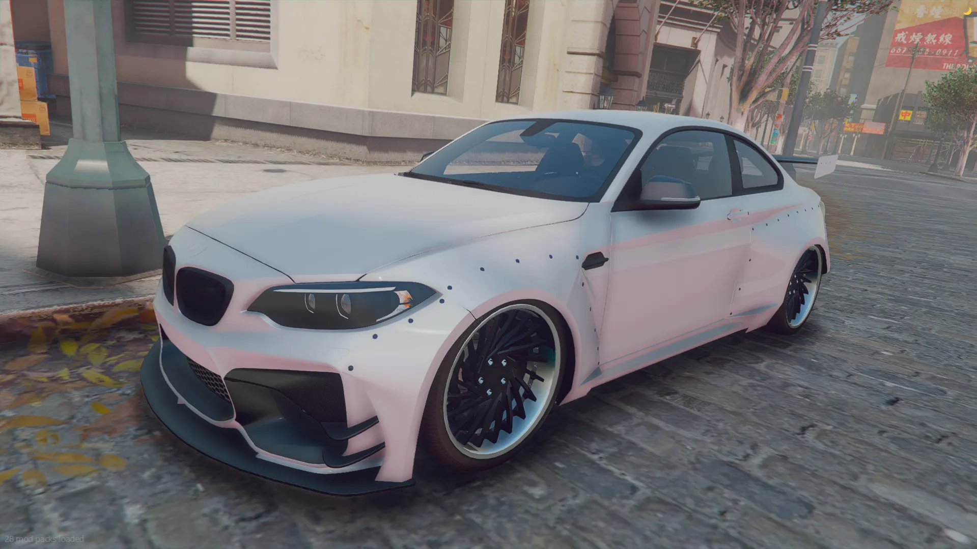 BMW M2 Competition 2018 FiveM car in white with riveted fender flares and black mesh wheels on a cobblestone street